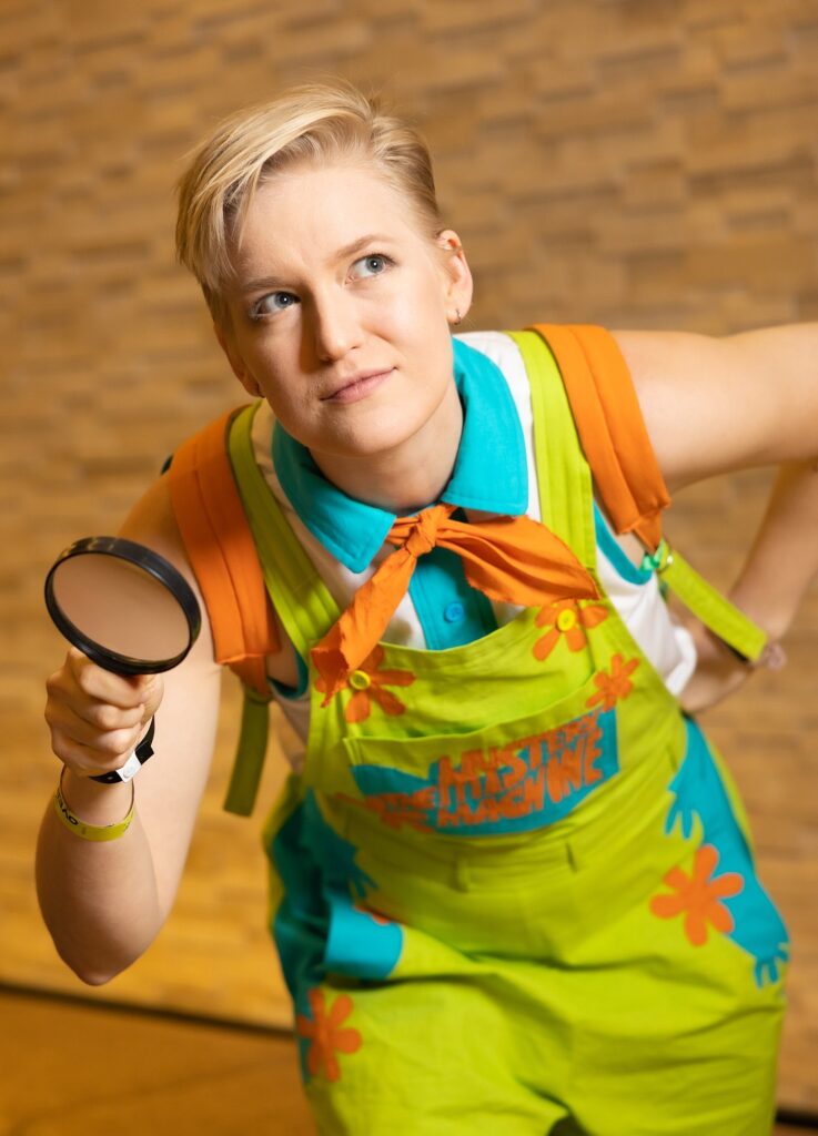 Char Grey wearing the Mystery Machine overalls